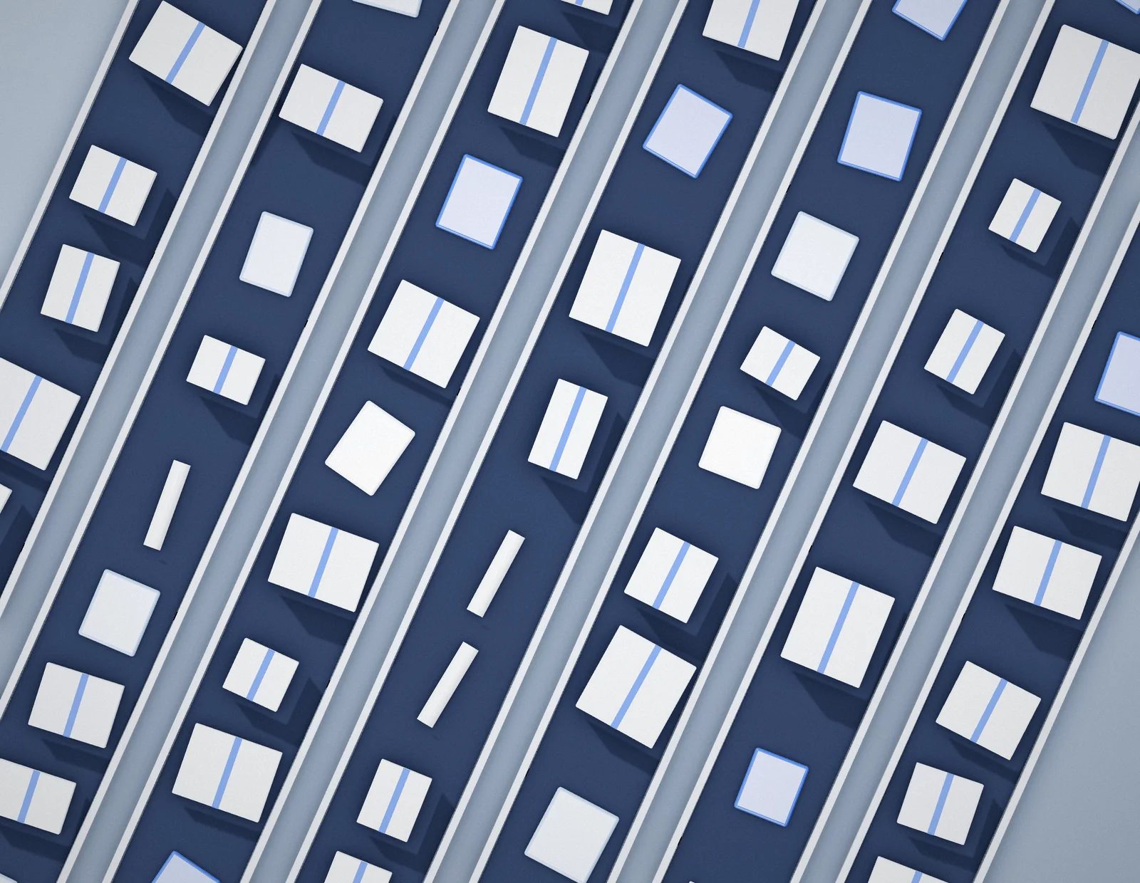 Aerial view of parcels moving along parallel conveyor lines
